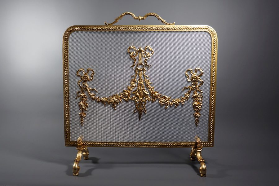 Pare feu en bronze doré